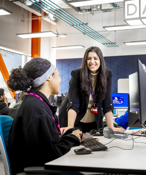 Two females are chatting in the Data Junction