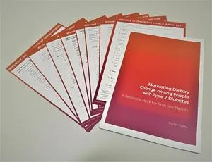 Red booklet and worksheets titled 'Motivating dietary change among people with Type 2 Diabetes.'