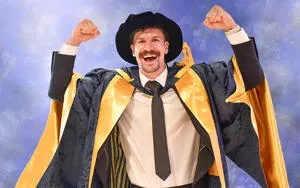Nathan Heaney in his honorary doctor cap and gown