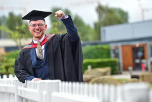 Rory Laudanski in his graduation cap and gown
