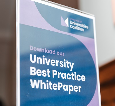 Sign which invites people to download the report